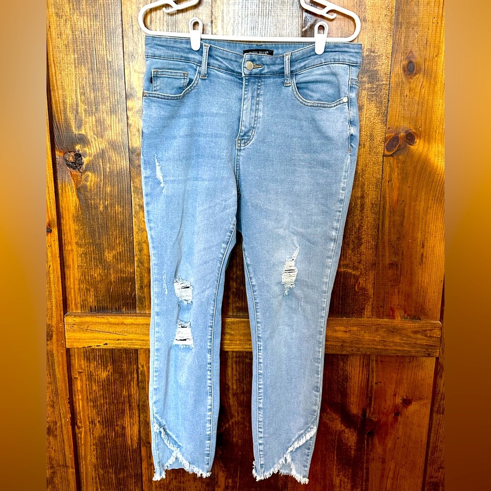 Judy Blue skinny fit distressed blue jeans with raw hem. Size 14W.